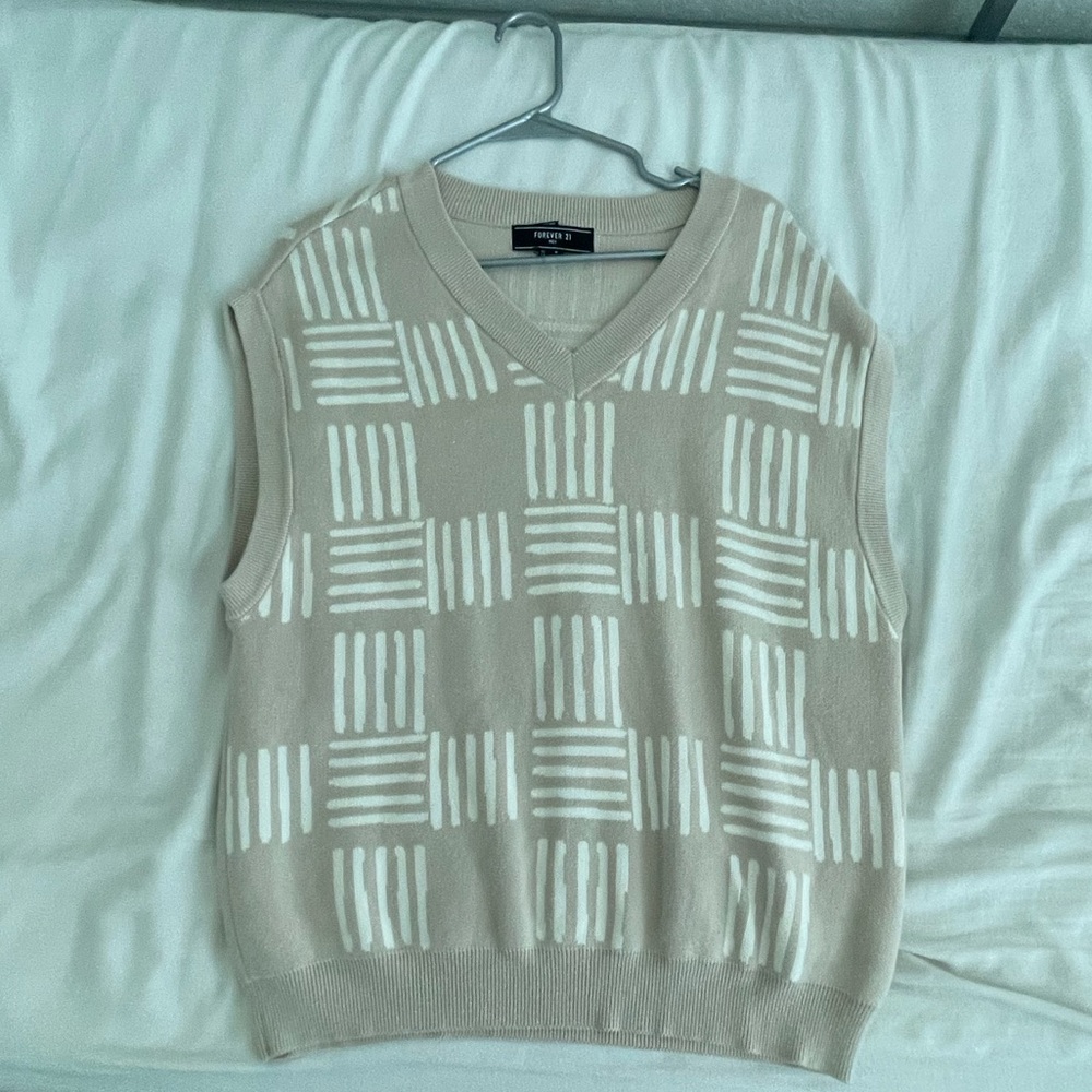 beige sweater vest